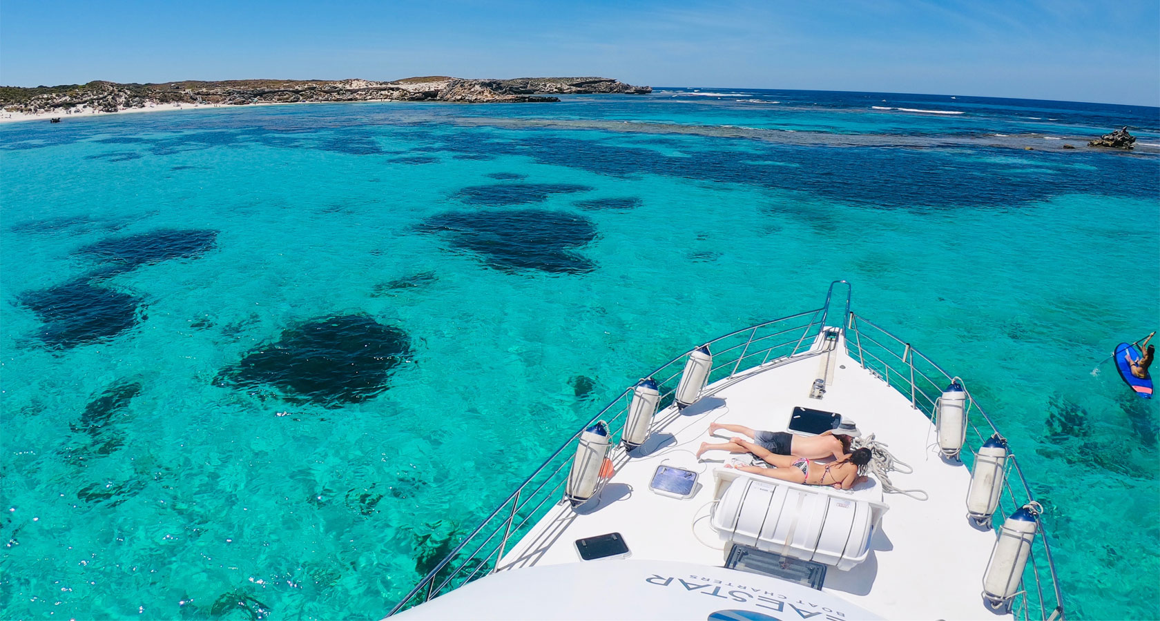 AUSTRALIA BLUE-boat-charters-Perth-WA-sunbathing-on-bow